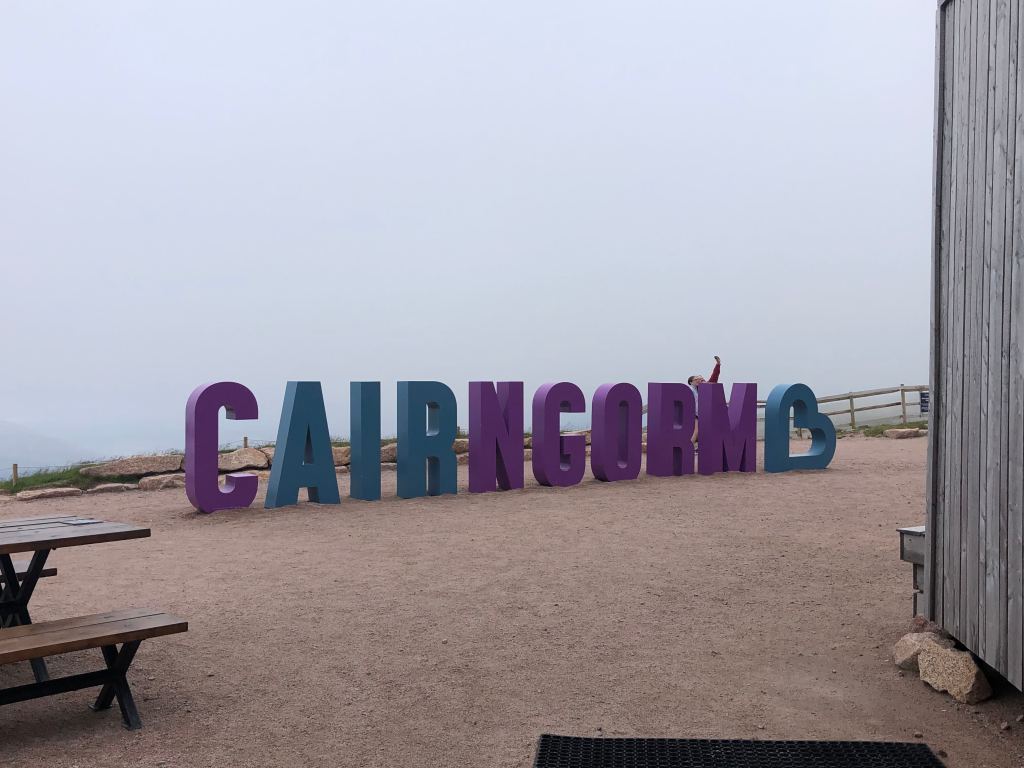 The giant purple and blue letters spelling out Cairngorm at the top of the mountain.